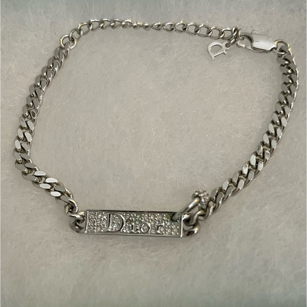 CHRISTIAN DIOR Pierced Logo Tag Bracelet
Early 2000’s